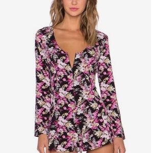 Beautiful long sleeve pink & white floral romper